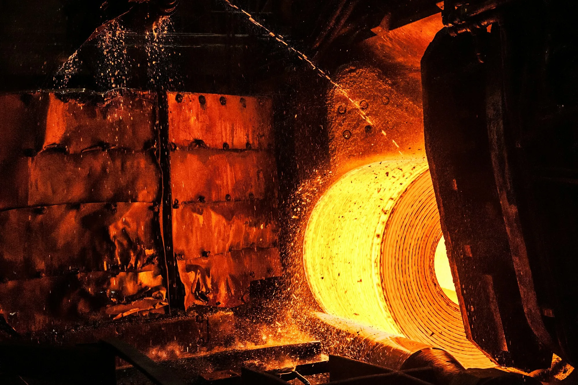 Roll of hot metal on the conveyor belt